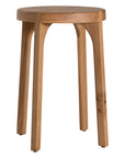 A sleek natural oak round stool featuring a minimalist design with subtly curved legs. Crafted from solid oak with a clear finish, this versatile piece functions as a stool or side table, adding a modern touch to any space