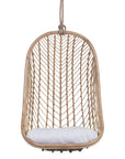 Natural rattan hanging egg chair with a plush white cushion, featuring a woven open-weave design and sturdy rope for a stylish and relaxing indoor or outdoor seating option