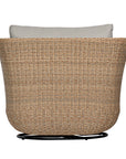 Natural rattan swivel armchair with plush barley cushions, offering a blend of comfort and contemporary coastal style