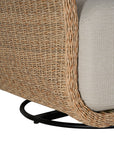 Natural rattan swivel armchair with plush barley cushions, offering a blend of comfort and contemporary coastal style