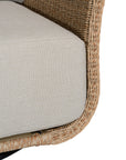 Natural rattan swivel armchair with plush barley cushions, offering a blend of comfort and contemporary coastal style