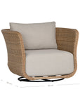 Natural rattan swivel armchair with plush barley cushions, offering a blend of comfort and contemporary coastal style