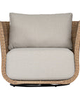 Natural rattan swivel armchair with plush barley cushions, offering a blend of comfort and contemporary coastal style