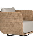 Natural rattan swivel armchair with plush barley cushions, offering a blend of comfort and contemporary coastal style
