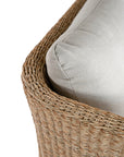 Natural rattan three seater with plush barley cushions, offering a blend of comfort and contemporary coastal style