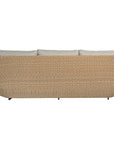 Natural rattan three seater with plush barley cushions, offering a blend of comfort and contemporary coastal style