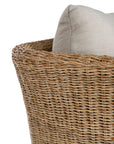 Natural rattan three seater with plush barley cushions, offering a blend of comfort and contemporary coastal style