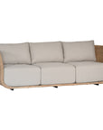Natural rattan three seater with plush barley cushions, offering a blend of comfort and contemporary coastal style