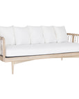 Natural rope lounge three seat sofa with white cushions, featuring a light timber frame and modern coastal aesthetic.