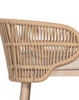 Handwoven rope counter stool with a curved backrest, cushioned seat, and sturdy wooden legs, perfect for relaxed coastal and modern interiors