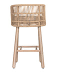 Handwoven rope counter stool with a curved backrest, cushioned seat, and sturdy wooden legs, perfect for relaxed coastal and modern interiors