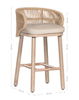 Handwoven rope counter stool with a curved backrest, cushioned seat, and sturdy wooden legs, perfect for relaxed coastal and modern interiors