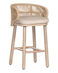 Handwoven rope counter stool with a curved backrest, cushioned seat, and sturdy wooden legs, perfect for relaxed coastal and modern interiors