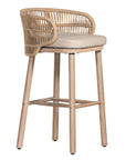 Handwoven rope bar stool with a curved backrest, cushioned seat, and sturdy wooden legs, perfect for relaxed coastal and modern interiors