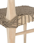 Natural wooden dining chair with a woven seat, showcasing a minimalist and rustic design perfect for modern interiors.