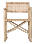 Natural rattan armchair with rustic branch frame, perfect for adding a touch of organic texture to any dining space