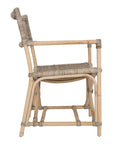 Natural wicker armchair with armrests and a sturdy cross-frame base, showcasing a contemporary design suitable for indoor or outdoor dining spaces.