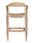 Bar stool crafted from natural wood with a curved backrest and handwoven rope seat, blending organic textures with a modern silhouette