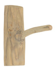 A handcrafted natural wood wall hook with a rustic finish, showcasing organic grain patterns and a sturdy design. Perfect for hanging towels, bags, or decor in a minimalist or coastal-inspired space