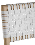 A stylish natural wood dining chair featuring a woven white leather seat and backrest, blending modern design with organic textures