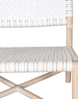 A stylish natural wood occasional chair featuring a woven white leather seat and backrest, blending modern design with organic textures.