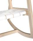A stylish natural wood rocking chair featuring a woven white leather seat and backrest, blending modern design with organic textures