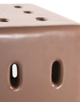 Niche coffee table in penny finish with rectangular form and perforated detailing across the surface and sides.