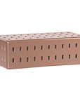 Niche coffee table in penny finish with rectangular form and perforated detailing across the surface and sides.