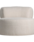 A contemporary pebble upholstered lounge chair with a low-profile design and curved backrest. This modern, armless seating piece features a smooth, rounded silhouette, making it a stylish and comfortable addition to any living space