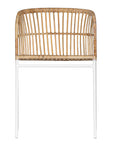 Modern rattan dining chair with a white metal frame, featuring a curved backrest and woven natural rattan for a stylish and airy aesthetic