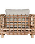 Handcrafted rattan one seater sofa featuring an intricate open-weave frame with plush natural cushions, combining natural texture with contemporary comfort for indoor or covered outdoor spaces