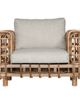 Handcrafted rattan one seater sofa featuring an intricate open-weave frame with plush natural cushions, combining natural texture with contemporary comfort for indoor or covered outdoor spaces