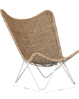 A stylish rattan sling chair with a white metal frame, featuring an airy woven seat and a relaxed silhouette, perfect for modern coastal and bohemian interiors.