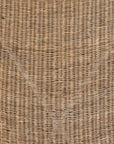 A stylish rattan sling chair with a white metal frame, featuring an airy woven seat and a relaxed silhouette, perfect for modern coastal and bohemian interiors.