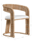 A natural rattan dining chair with a curved backrest and a white upholstered cushion. The woven design and sturdy frame create a stylish and comfortable seating option, perfect for modern coastal or relaxed interiors