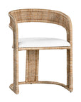 A natural rattan dining chair with a curved backrest and a white upholstered cushion. The woven design and sturdy frame create a stylish and comfortable seating option, perfect for modern coastal or relaxed interiors