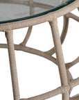 Contemporary aluminium rope weave coffee table with a glass top, featuring an open, airy design in a neutral tone, perfect for modern coastal or bohemian-inspired interiors