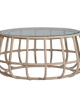 Contemporary aluminium rope weave coffee table with a glass top, featuring an open, airy design in a neutral tone, perfect for modern coastal or bohemian-inspired interiors