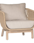 A stylish rope weave armchair with a natural wood frame and soft linen cushions. Designed for both indoor and outdoor use, this chair offers a relaxed, contemporary aesthetic perfect for modern and coastal-inspired interiors