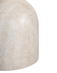 Round sculptural dining table crafted from natural travertine stone, featuring a smooth circular top and a rounded pedestal base. Elegant and timeless design ideal for contemporary and refined dining spaces.