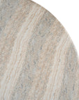Round sculptural dining table crafted from natural travertine stone, featuring a smooth circular top and a rounded pedestal base. Elegant and timeless design ideal for contemporary and refined dining spaces.