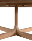 The Kulala Living Round Teak Coffee Table, crafted from solid teak with a slatted tabletop and sturdy block legs. This timeless design adds warmth and natural texture to any living space.