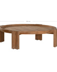 The Kulala Living Round Teak Coffee Table, crafted from solid teak with a slatted tabletop and sturdy block legs. This timeless design adds warmth and natural texture to any living space.