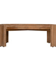 The Kulala Living Round Teak Coffee Table, crafted from solid teak with a slatted tabletop and sturdy block legs. This timeless design adds warmth and natural texture to any living space.
