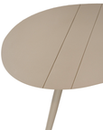 Solara coffee table with organic curved shape and light finish on a clean studio background.