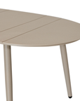 Solara coffee table with organic curved shape and light finish on a clean studio background.