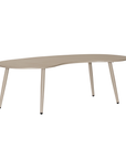 Solara coffee table with organic curved shape and light finish on a clean studio background.