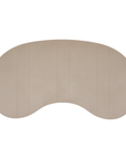 Solara coffee table with organic curved shape and light finish on a clean studio background.