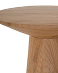A modern solid oak side table with a sculptural conical base and smooth rounded top, showcasing natural wood grain variations for an organic aesthetic