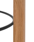 Kulala Living solid oak bar stool with a round seat and black metal footrest. A minimalist and timeless design, perfect for contemporary and coastal interiors